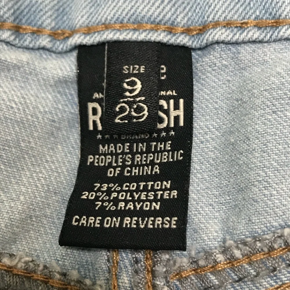 Rewash denim distressed